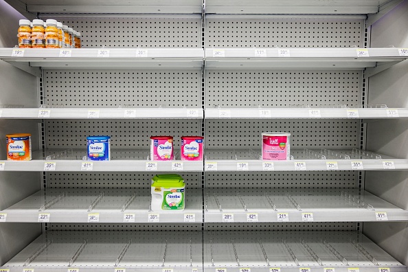 Empty formula shelves (Samuel Corum/Getty Images)