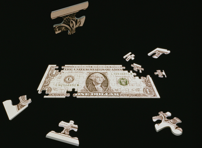 Pieces of the dollar puzzle (John Lund/Getty Images)