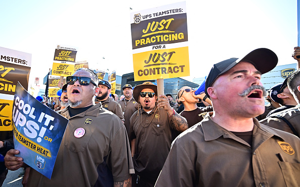 The summer of picket signs (Frederic J. Brown/Getty Images)