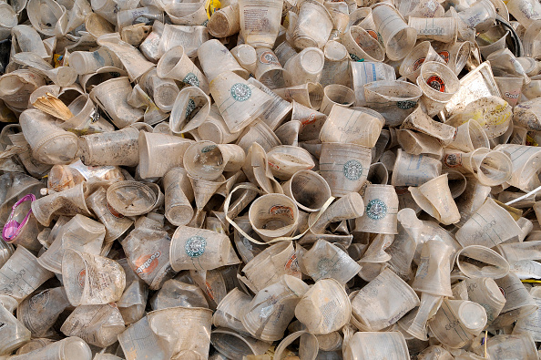Single-use plastic cups at a garbage dump outside Jakarta, Indonesia [John van Hasselt/Corbis via Getty Images]