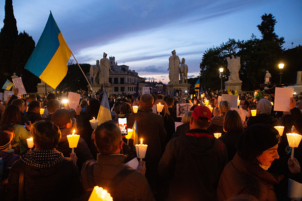 In Rome, a torchlight procession for peace in Ukraine (Pacific Press via Getty Images)