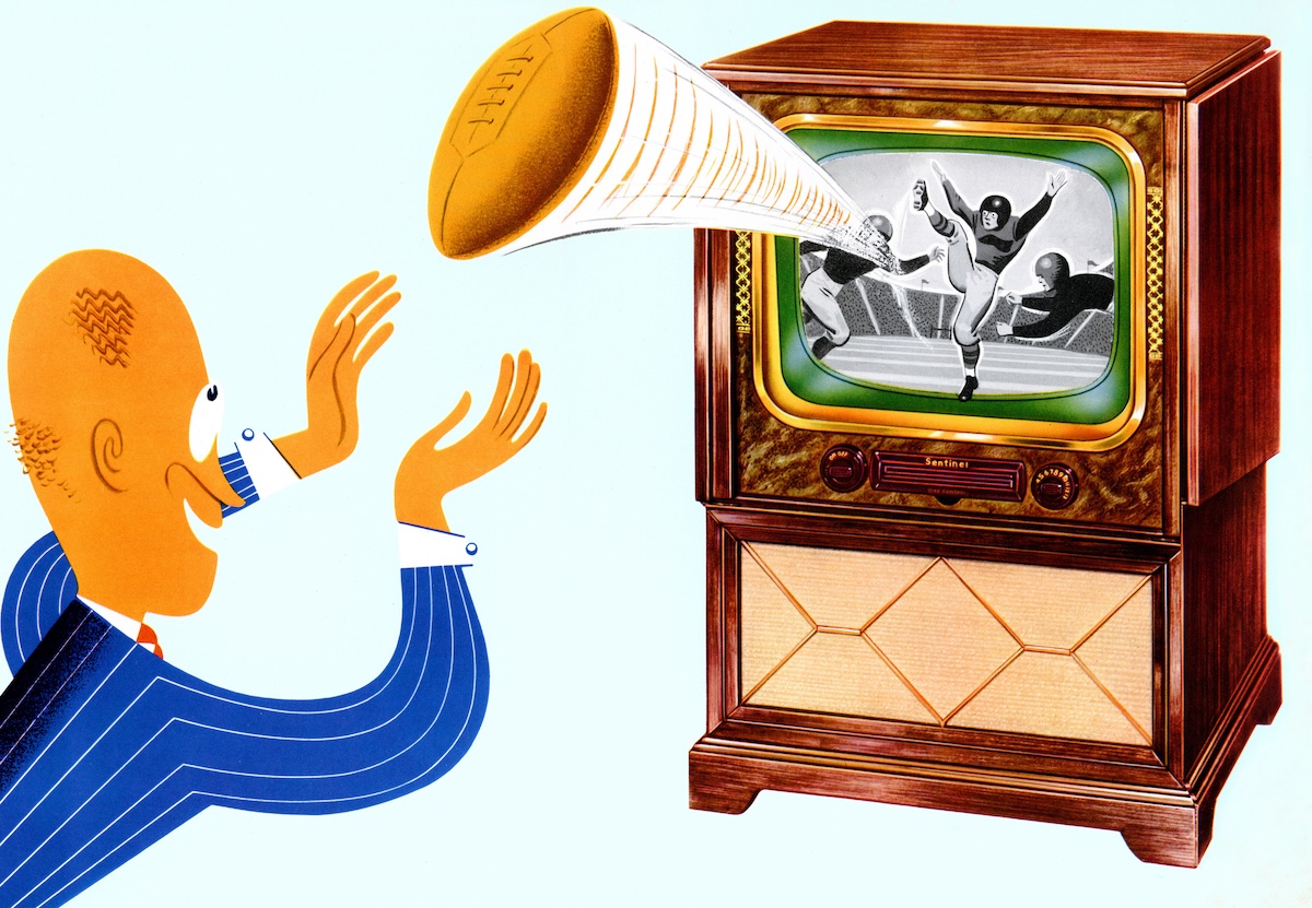 Man Catching Football from TV