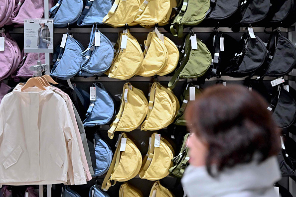 Uniqlo has alleged that Shein sold knockoffs of its viral shoulder bag (Richard A. Brooks/Getty Images)