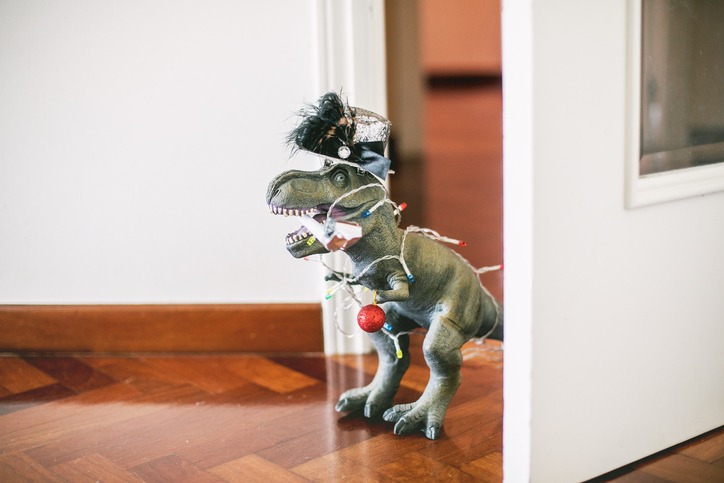 Baby Dino is ready for Christmas [Carol Yepes/Moment via Getty Images]
