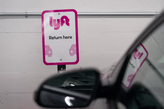 Lyft return here sign
